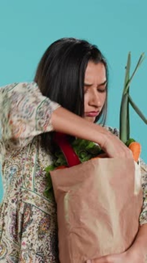 Vertical Video Upset Woman Frowning After Forgetting to Buy Some Groceries
