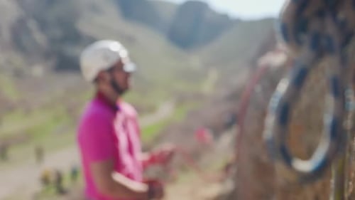 Man Athlete Climbing on the High Rock