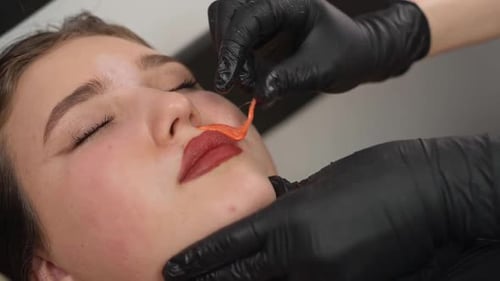 Woman Getting Wax Treatment on Upper Lip
