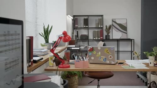 Office Desk with Laptop and Stationery Supplies