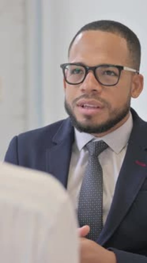Close Up of Talking Business People, vertical video