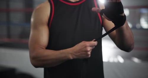 Hands, man and wrap for boxing at gym for wrestling match, fitness ready