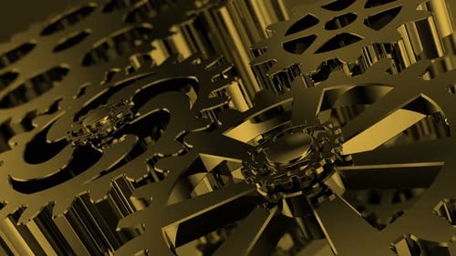 Golden Metallic Gears Spinning Smoothly in Close Up