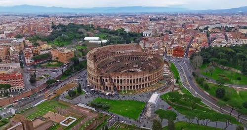 Establishing Shot Drone Flying of the Colosseum Famous Ancient Roman Arena Downtown Rome Italy The