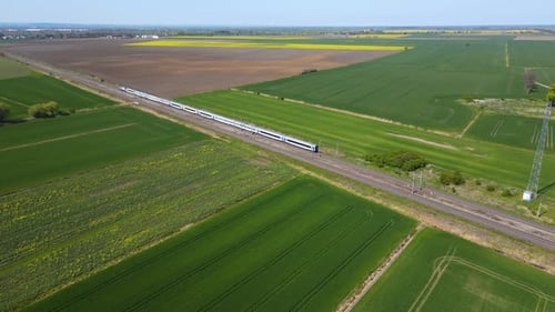 Highspeed Train Aerial View of Fast Passenger Train Driving on Railroad Passing High Speed Train in
