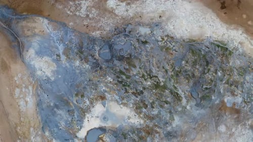 Ascending On Boiling Mudpots In Hverir Geothermal Field Near Lake Myvatn, Iceland. Aerial Drone Shot