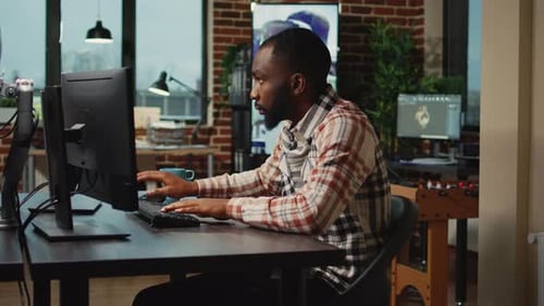 African American Man Working on 3d Engineering or Cgi