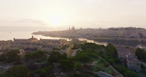 Serene Aerial View of Valletta Malta at Sunset Overlooking the Urban Landscape