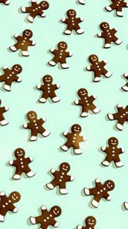 Gingerbread Cookies on a Light Green Background