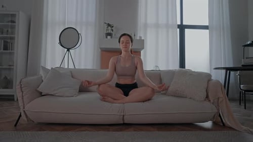 Female Practice Deep Breathing and Relaxation Techniques