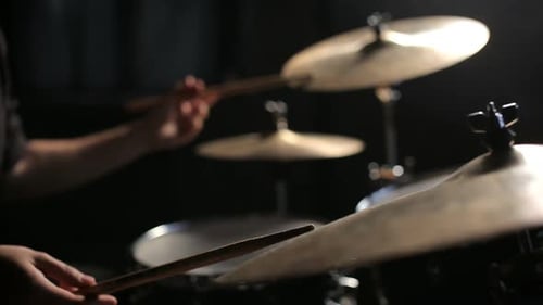 Drummer Playing the Drums