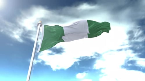 Nigerian Flag Waving with Blue Sky and Clouds