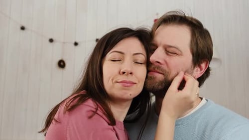Affectionate Couple Embracing Indoors
