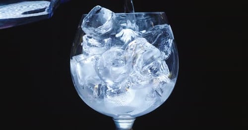 A professional bartender prepares a cocktail to drink for customers at the pub or disco. Concept o