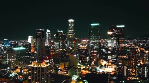 Nighttime cityscape of downtown Los Angeles from an aerial perspective