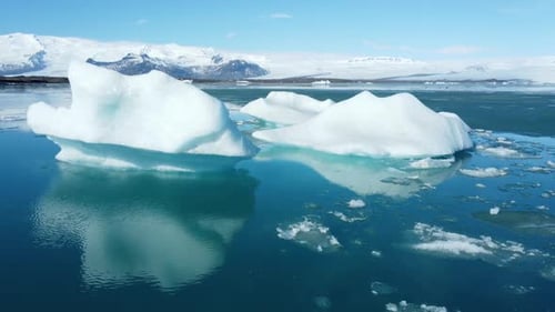 Iceberg From Melting Glacier in Iceland Arctic Nature with Pure White Snow and Blue Ice Cold