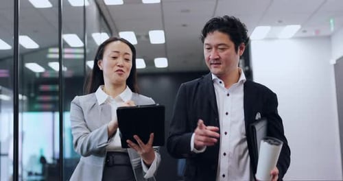Japanese, people and walking with tablet in office for finance report, planning budget