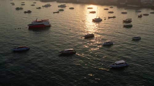 Looking down at Boats anchored in harbor with nice reflections