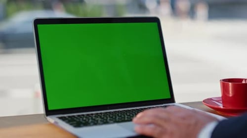 Businessman Fingers Scrolling Mockup Laptop Touchpad Working at Cafe Closeup