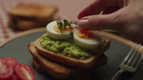 Delicious Avocado Toast with Boiled Egg Close Up