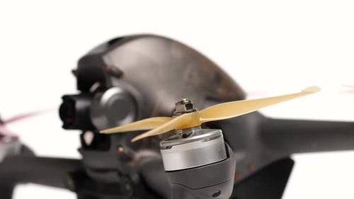 FPV drone propellers closeup, racing drone. Cinematic Shot of DJI FPV racing quadcopter.