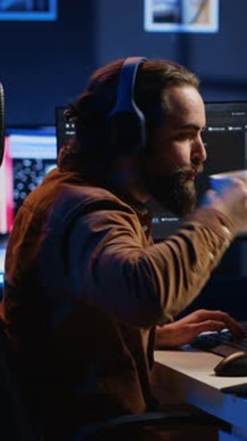 Programmer Does Multitasking Drinks Coffee Listens Music