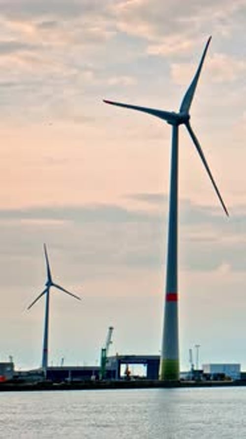Wind Turbines in Antwerp Port on Sunset