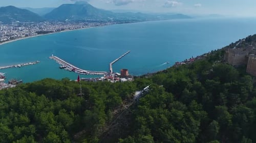 Aerial Video of a Magical View of Alanya With a Castle on a Rocky Slope and the Deep Blue