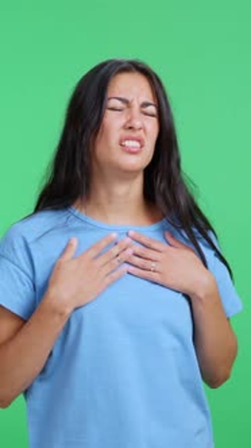Woman with Bad Cough Feeling Unwell on Green Screen Background