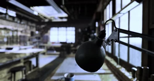 Lighting Fixture Brightens Rustic Studio with Natural Light