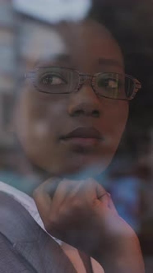 Business Woman Sitting at Cafe with Table
