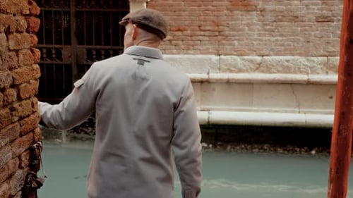 Back View Of Tourist Near Venice Canals