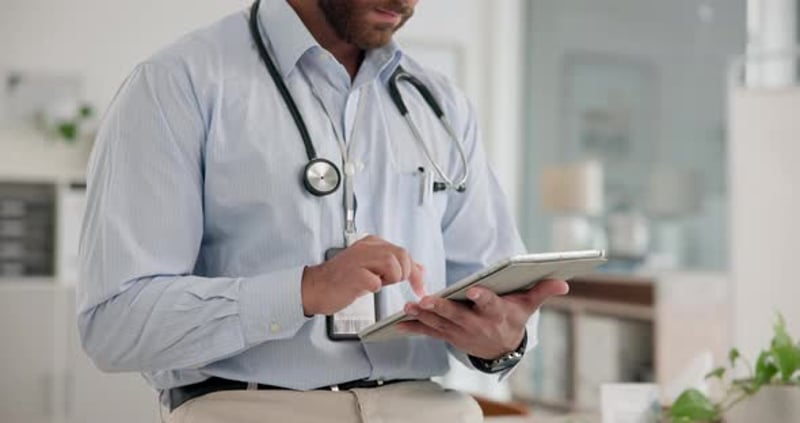 Young Doctor Using Phone at Desk in Office, Medical Stock Footage ft ...