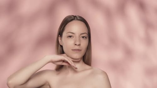 Woman Posing and Touching Her Face