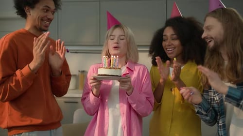 Friends Celebrate Birthday With Cake and Party Favors