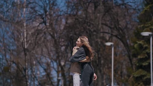 Happy young couple spend time outdoors.