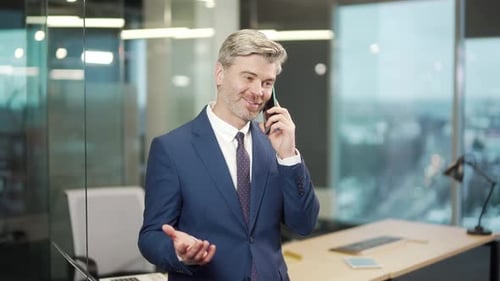 Mature business man hold smartphone communicate and talk. senior gray hair middle aged businessman