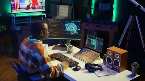 African American IT Professional Managing AI System for Machine Learning