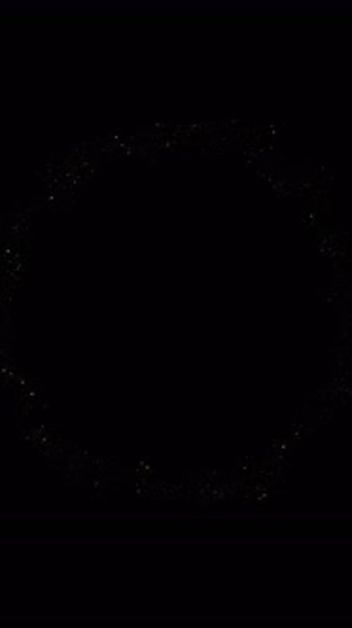 Cercle à paillettes dorées qui scintillent de lumière. Bague dorée scintillante, lueur magique, lumière vive