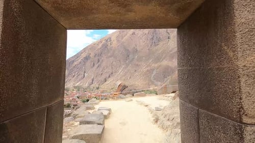 Archaeological Ruins of old Inca city, Ollantaytambo, Sacred Valley, Peru - handheld shot