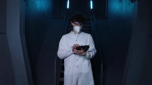 Biotechnologist Making Notes While Working in a Secret Laboratory