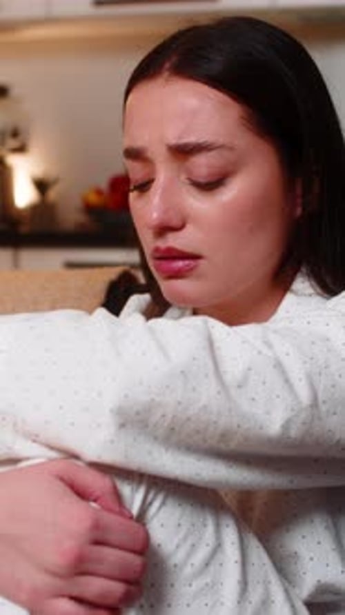 Woman Crying in a Home Interior