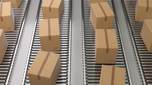 Cardboard boxes moving on a warehouse conveyor belt