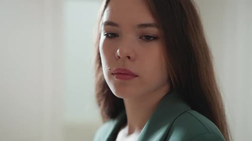 Close Up of Young Adult in Green Blazer