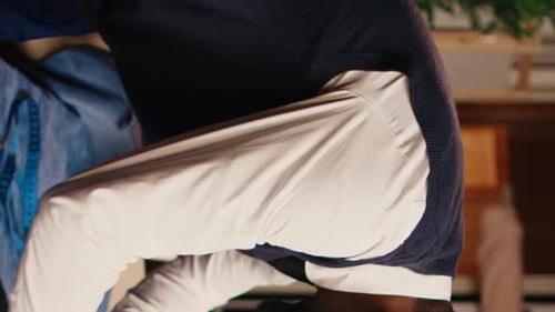 Tailor Chalking Fabric at Workbench for Clothing Design