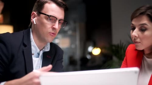 In Creative Office Productive Coworkers Standing at the Table Company Meeting Businessman And Woman