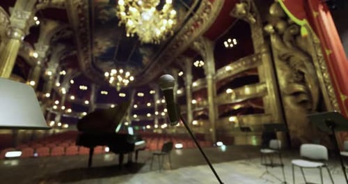 Microphone Stands Ready for Performance in an Ornate Theater Setting