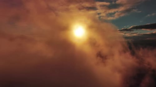 Aerial View of Orange Fluffy Cloud in Sky