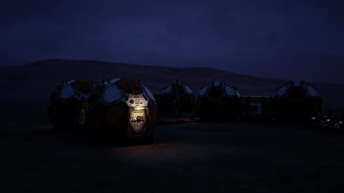 Mars Colony Base Illuminated at Night in a Remote Extraterrestrial Landscape
