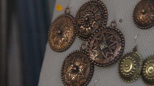 metal jewelry, earrings exhibited at the craft market